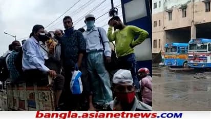 চলছে না বাস, কান্নায় ভেঙে পড়ল কর্মীরা, প্রাণের ঝুঁকি নিয়ে পণ্যবাহী গাড়িতে অফিস যাত্রীরা