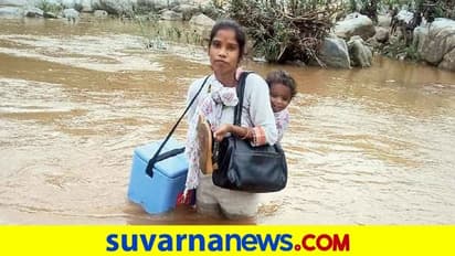 ಬೆನ್ನ ಹಿಂದೆ ಮಗು, ಒಂದು ಕೈಯಲ್ಲಿ ವಾಕ್ಸಿನ್.. ಕೊರೋನಾ ವಾರಿಯರ್ಸ್ಗೆ ನಮನ