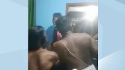 గుళ్లో దేవుడి ముందే మహిళ జుట్టుపట్టుకుని చితకబాదిన అర్చకుడు..