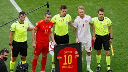 എറിക്സണ് സ്നേഹം തുന്നിയൊരു സമ്മാനം, ആദരം; മനം കീഴടക്കി ബെയ്ലും വെയ്ല്സും