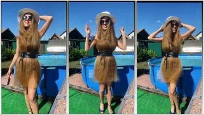 ടോപ്പില്ല, സ്‌കര്‍ട്ടില്ല, നീളന്‍ മുടി വസ്ത്രമാക്കി  ധരിച്ച് ഒരു പെണ്‍കുട്ടി!