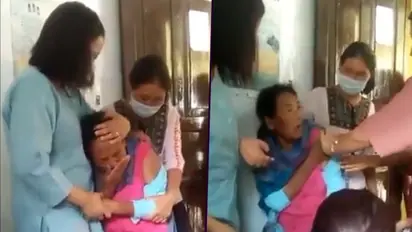 Woman screams out in fear while taking Covid-19 Vaccine; Watch hilarious video