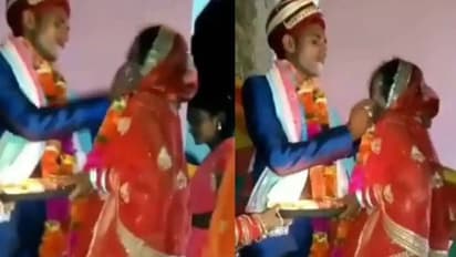 വധുവിന് നിർബന്ധിച്ച് മധുരം നൽകി വരൻ, ധാർഷ്ട്യം നിറഞ്ഞ പെരുമാറ്റത്തെ ചോദ്യം ചെയ്ത് സോഷ്യൽമീഡിയ