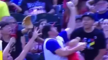 Dad drops baby to catch ball during baseball game; watch what happened next