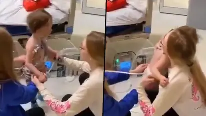 Boy takes steps first step following heart surgery; heart-warming video goes viral