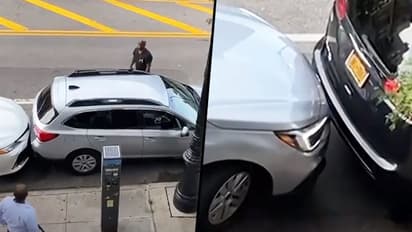 Man moves car out of tight parking spot; watch viral video