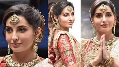 লাল পাড় সাদা শাড়ি, ওয়েস্টার্ন নয় সম্পূর্ণ বাঙালি লুকেই নেটিজেনদের অবাক করে দিলেন নোরা