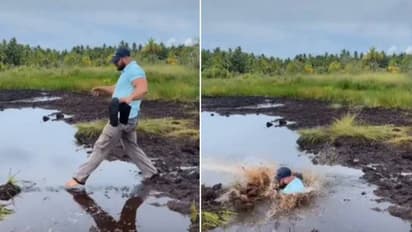 ചെളിവെള്ളത്തിൽ മുങ്ങി ഭർത്താവ്, പൊട്ടിച്ചിരിച്ച് ഭാര്യ, വീഡിയോ വൈറൽ