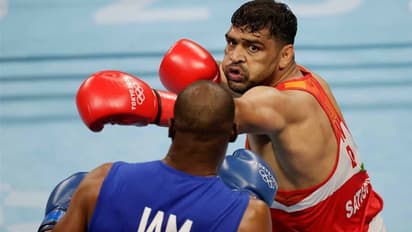 বক্সিং কোয়ার্টার ফাইনালে সতীশ কুমার, আর একটি বাউট জিতেলেই পদক নিশ্চিৎ