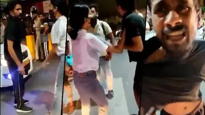 Girl thrashes taxi driver in presence of police in middle of a street; watch viral video