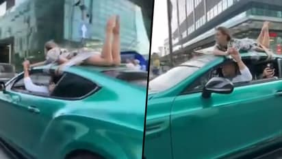 Russian 'influencer' drives with girlfriend tied to car roof for 'trust test'; watch video