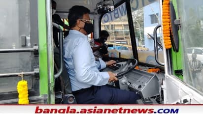CNG Bus: শহরে প্রথম গ্যাসচালিত বাসের যাত্রা শুরু, নিজেই বাস চালালেন ফিরহাদ
