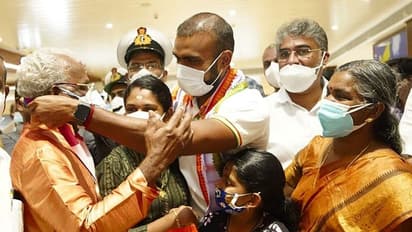 Touching moment: PR Sreejesh presents Olympic bronze medal to his father on arrival in Kochi