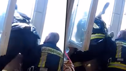 Firefighter grabs suicidal man mid-air; incredible saving video goes viral