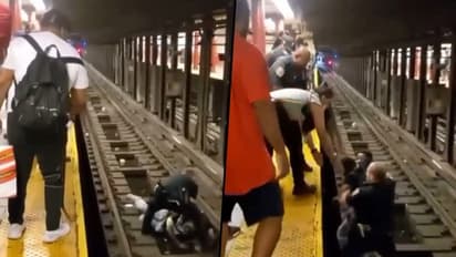 Passengers collapse on subway tracks gets saved by NYPD Officers; watch video