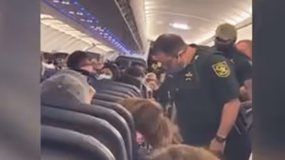 Woman lights up cigarette on plane and starts smoking; find out what happened next