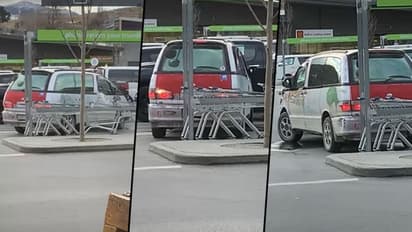 Watch a driver takes '150-point turn' rather than reversing out of space