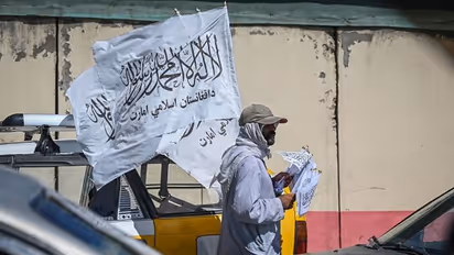 Taliban fire shots in air as 1,000 men and women chant 'Death to Pakistan' during anti-Pakistan rally