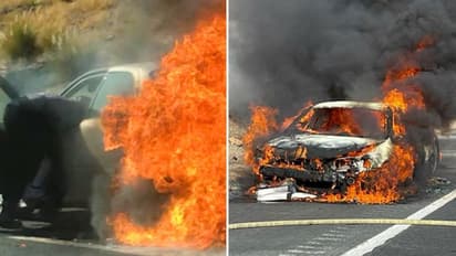 California: Elderly couples being rescued by bystanders from a burning car; watch nail-biting video