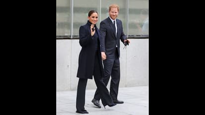Proud dad! Prince Harry carries briefcase with ‘Archie’s Papa’ embossed on it