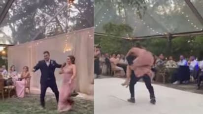 വിവാഹവേദിയിലെ ഡാൻസിനിടെ വധു വരന്‍റെ പുറത്തേയ്ക്ക് ചാടിക്കയറി; പിന്നീട് സംഭവിച്ചത്...