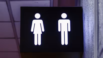 5 reasons why toilet door in malls, offices cut from bottom; Details inside