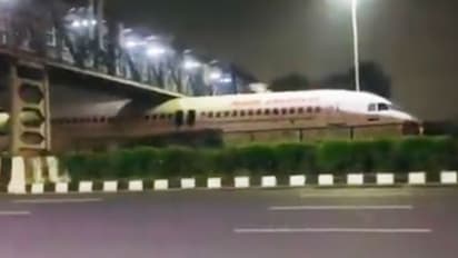 Air India plane gets stuck under the pedestrian foot-over bridge in Delhi