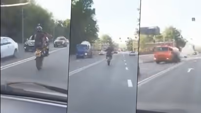 Watch: Biker doing wheelie stunt crashes with the tanker; video goes viral