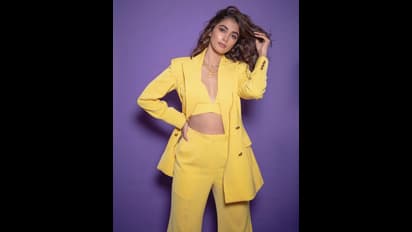 కోటు బటన్స్ తీసేసి లో దుస్తులు చూపిస్తూ బీస్ట్ బ్యూటీ పూజా హెగ్డే రచ్చ... షేక్ చేస్తున్న లేటెస్ట్ ఫోటో షూట్