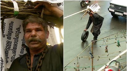 ഇന്ധന വില: പെടാപ്പാട് പെടുന്ന കര്ഷകന്റെ പ്രതിഷേധം; കറുപ്പുടുത്ത് ചങ്ങലയാൽ ബന്ധിച്ച് ചക്രമുരുട്ടി തങ്കച്ചൻ