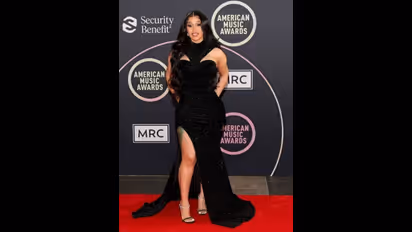 Cardi B stuns in black at American Music Awards; you can’t RESIST her ‘too hot to handle’ look (photos)