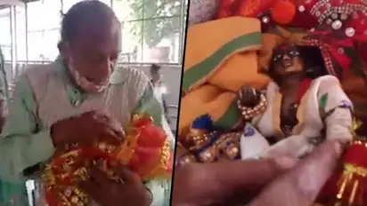 Priest visits hospital with broken Krishna idol; doctors bandage God’s arm (Watch)