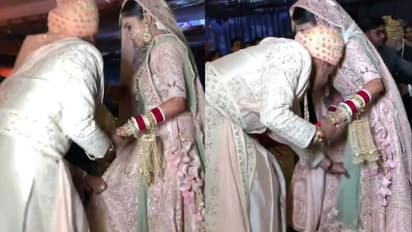 Viral Video :  'വീഴല്ലേ പൊന്നേ...'; വധുവിന്‍റെ ലെഹങ്ക പിടിച്ച് വരൻ; മനോഹരം ഈ വീഡിയോ