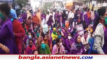 Asha Workers: ১৬ দফা দাবিকে সামনে রেখে জেলায় জেলায় বিক্ষোভ, নতুন বছরে বড় আন্দোলনের ডাক আশা কর্মীদের