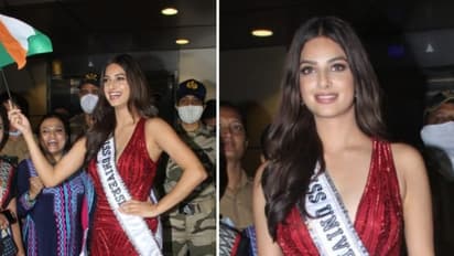Miss Universe 2021 Harnaaz Sandhu dons stunning red gown poses with Indian flag at Mumbai airport