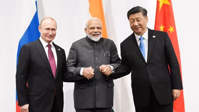 Vladimir Putin's aide says Russia, India and China to hold summit very soon