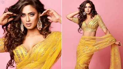 Shweta Tiwari flaunts washboard abs in yellow saree [PHOTOS]