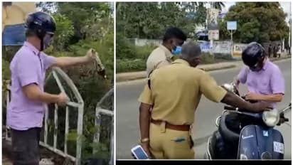 foreigner protest : കേരള പൊലീസിന്റെ മദ്യ പരിശോധന; സഹികെട്ട് രണ്ട് ഫുള്‍ റോഡരികിലൊഴിച്ച് വിദേശിയുടെ പ്രതിഷേധം