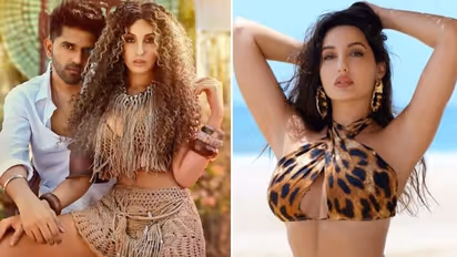 Here's what happened when Nora Fatehi kissed Guru Randhawa; take a look