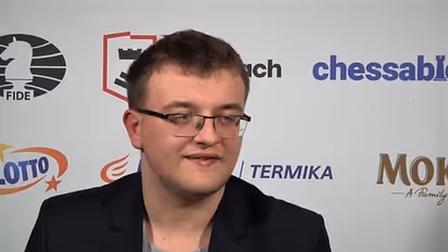 Polish chess player Pawel Teclaf becomes overnight sensation, but not for chess, for falling off chair