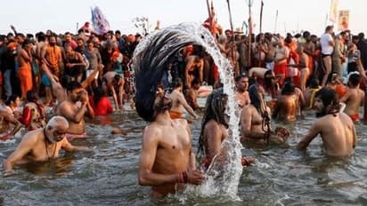bathing in Magh Mela