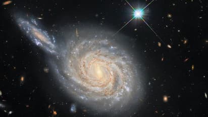 NASA Hubble : ഗാലക്സികൾ കൂട്ടിയിടിക്കുന്നോ? ഹബിൾ ടെലിസ്കോപ്പിലൂടെ നാസ പകർത്തിയ ചിത്രങ്ങളുടെ രഹസ്യം