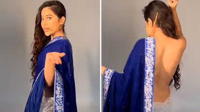 Urfi Javed goes bold, poses in saree without blouse; netizens furious