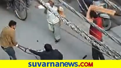 ಆಸ್ತಿ ವಿವಾದ: ನಡುರಸ್ತೆಯಲ್ಲೇ ಕುಟುಂಬದ ಮೇಲೆ ದೊಣ್ಣೆಯಿಂದ ಹಲ್ಲೆ