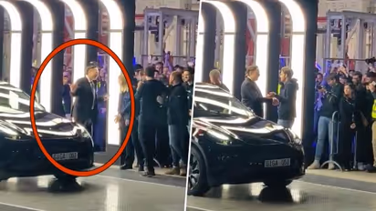 Elon Musk dances as he hands over Teslas from new German Gigafactory