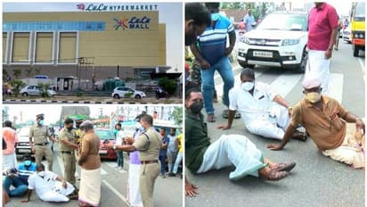 ജീവനക്കാരെ തടഞ്ഞു, തിരുവനന്തപുരം ലുലു മാളിന് മുന്നിൽ കുത്തിയിരുന്ന് സമരാനുകൂലികൾ