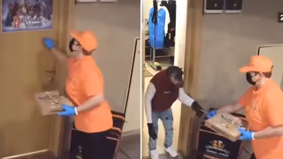 Watch: Delivery woman stunned after ape collects pizza order from her