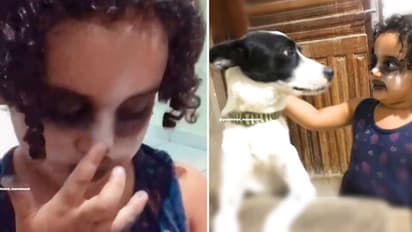 Toddler puts up makeup to look like her pet dog; internet can't keep calm