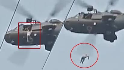 மீட்பு பணிகளின் போது ஹெலிகாப்டரில் இருந்து கீழே விழுந்த நபர் உயிரிழப்பு.. வைரலாகும் பரபர வீடியோ..!