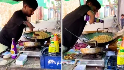Watch: Differently-abled man stir-fries noodles at his roadside stall; leaves internet emotional